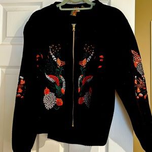 Full detail cardigan is made of wood size medium